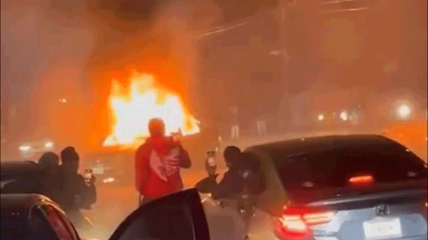 Street takeover in NYC concludes with a car set on fire and a couple assaulted in a deliberate attack