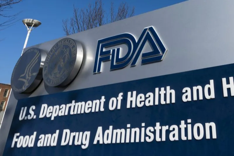Top drug regulator sued by pharmaceutical company, steps down during investigation into conduct