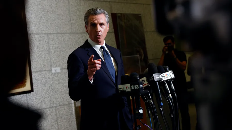 Trump administration sues to block California’s ban on masked federal agents