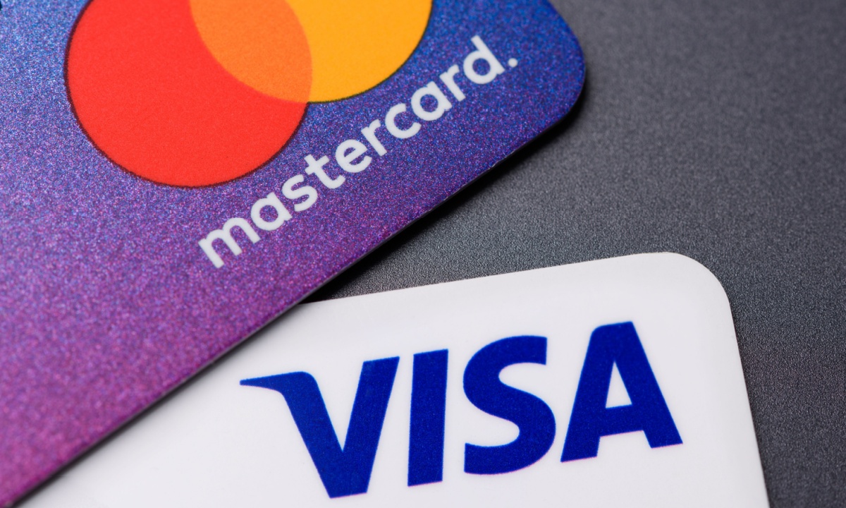 Visa and Mastercard Agreement for Merchants Focused on Rewards Cards
