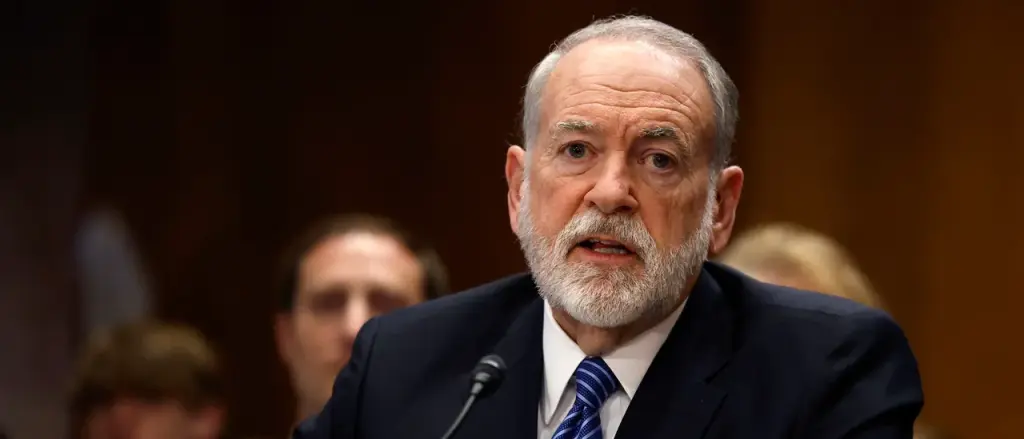 Who is the spy with an 'Israel First' focus who met with Mike Huckabee?