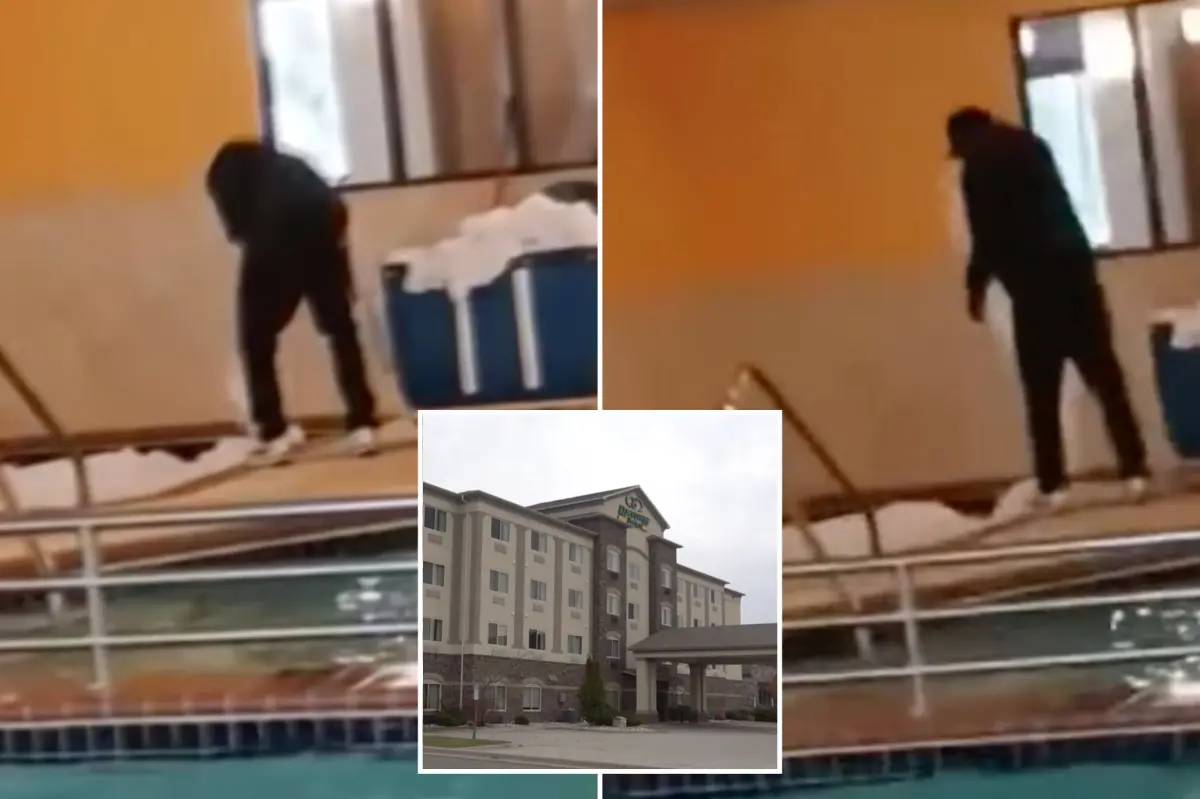 Worker at North Dakota hotel seen tossing bed sheets into hot tub, startling guests