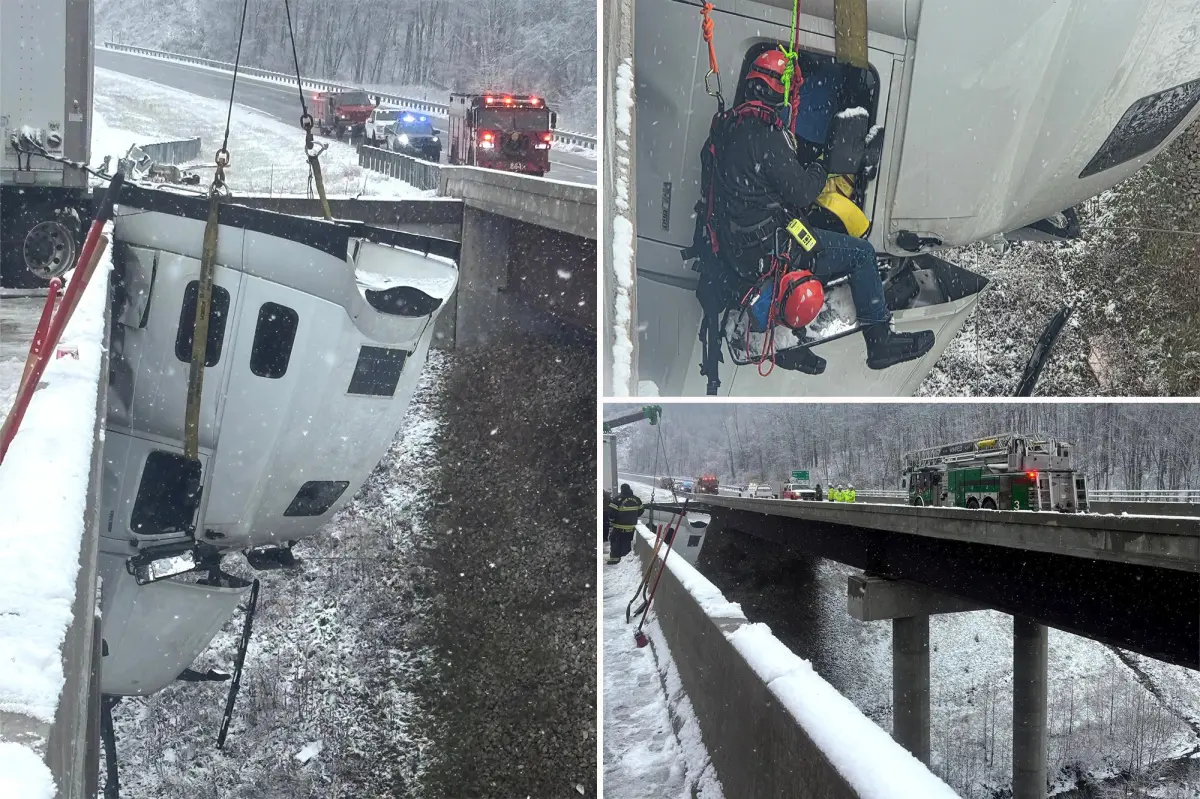 Driver saved after hanging 100 feet above the ground on a West Virginia highway
