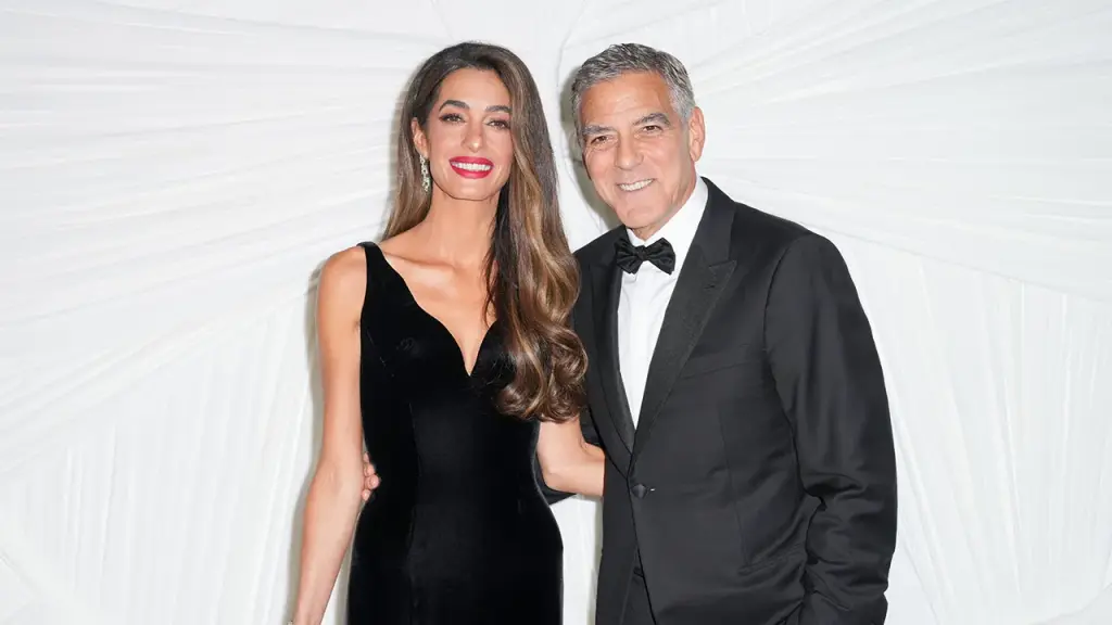 George Clooney shares relationship tips with Travis Kelce on a podcast.