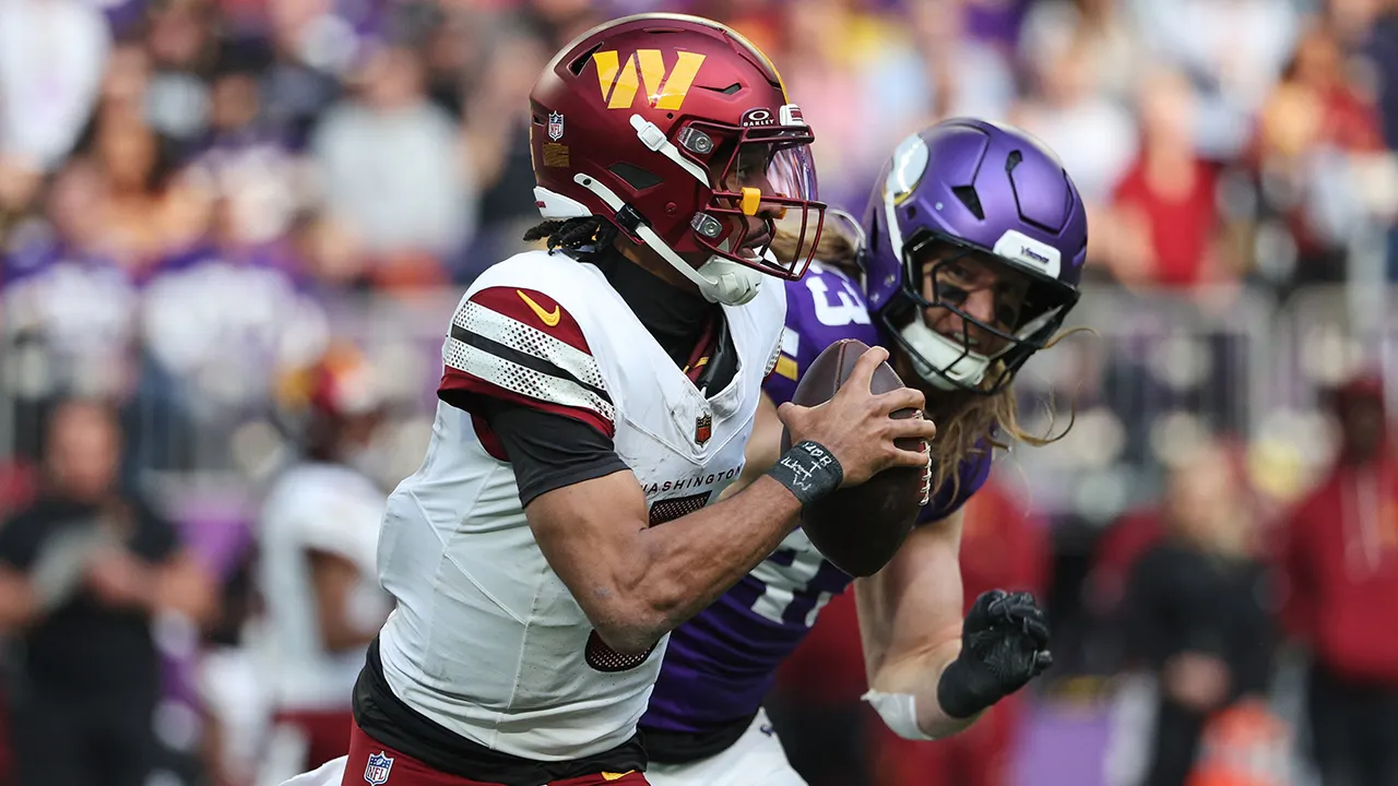 Jayden Daniels of the Commanders exits the game following a hit