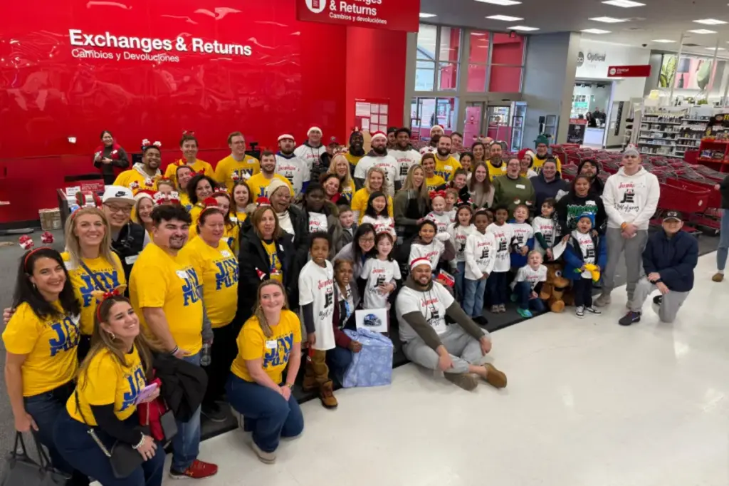 Jermaine Eluemunor of the Giants gains valuable insight at a holiday charity event