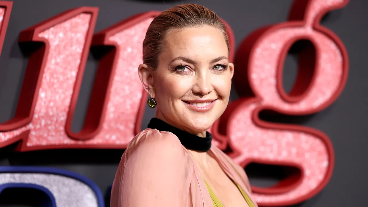 Kate Hudson dazzles in a green and pink dress at the NYC premiere of 'Song Sung Blue'
