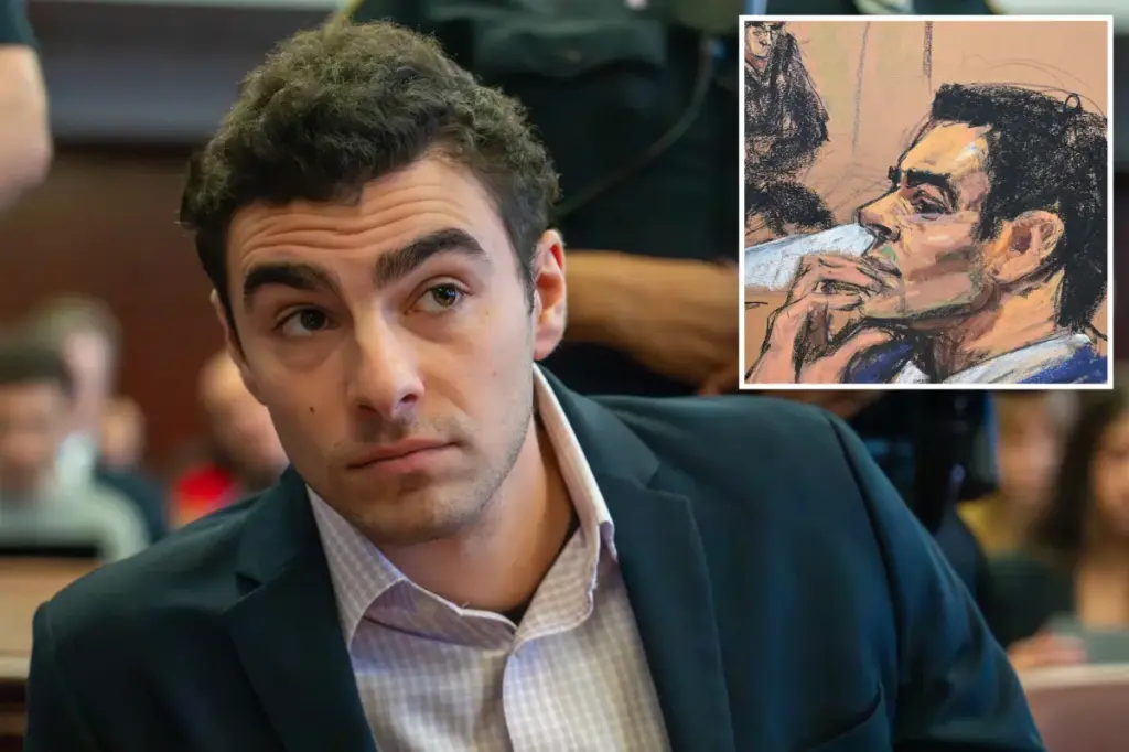 Luigi Mangione seems to anxiously bite his nails during the NYC court hearing.