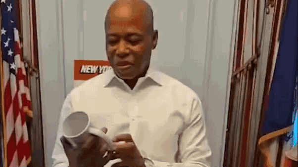 Mayor Eric Adams shares coffee mug quotes as he prepares to leave office