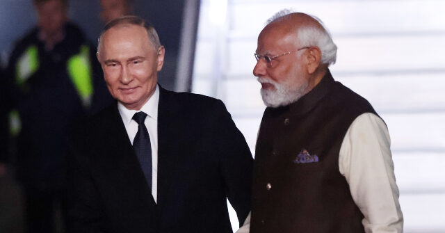 Modi of India Offers a Friendly Reception to Vladimir Putin