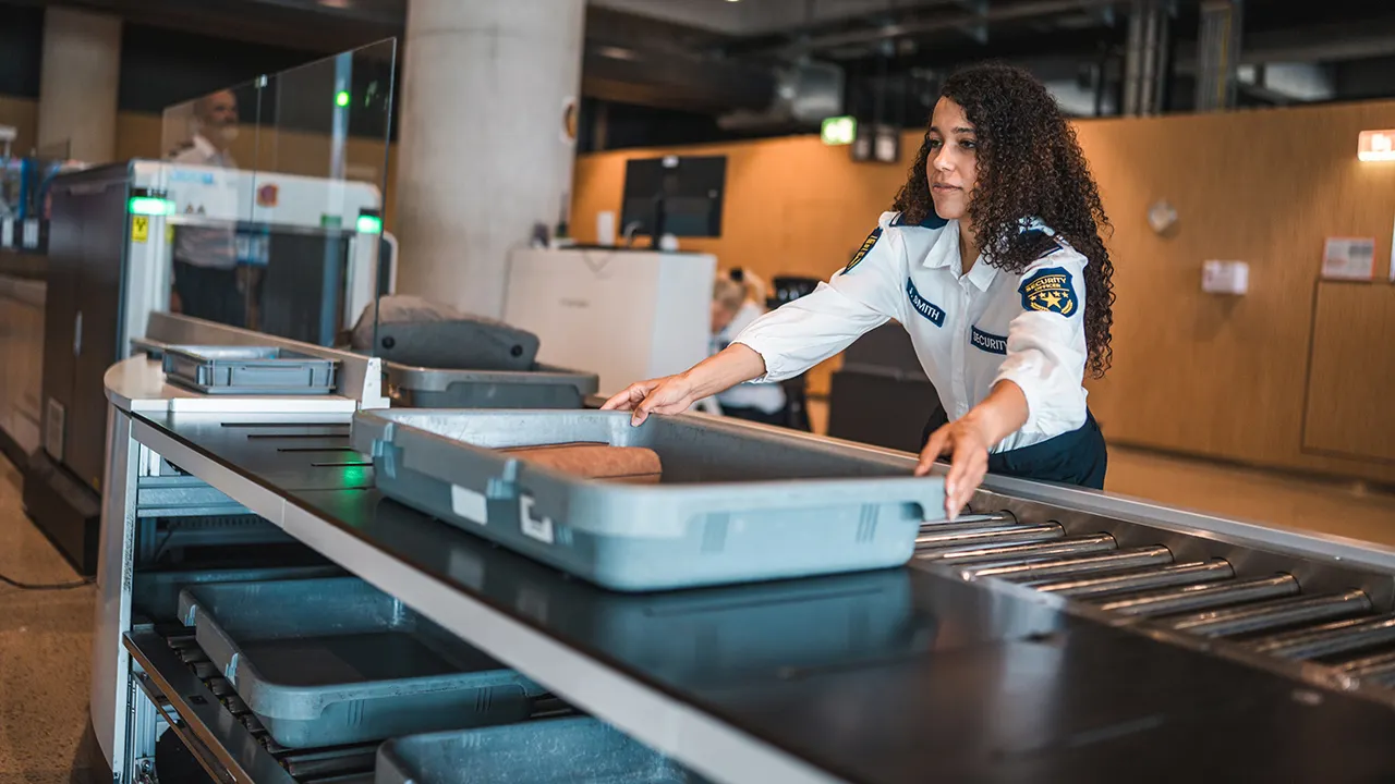 Online video gains popularity, igniting intense discussion about airport security bin arrangement