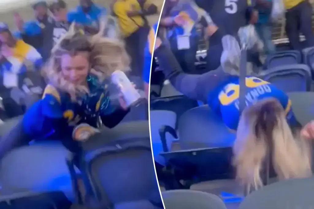 Rams fan falls down the stands while attempting to kick another spectator