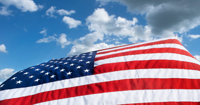 Skydivers Set World Record by Parachuting Old Glory from 10,000 Feet