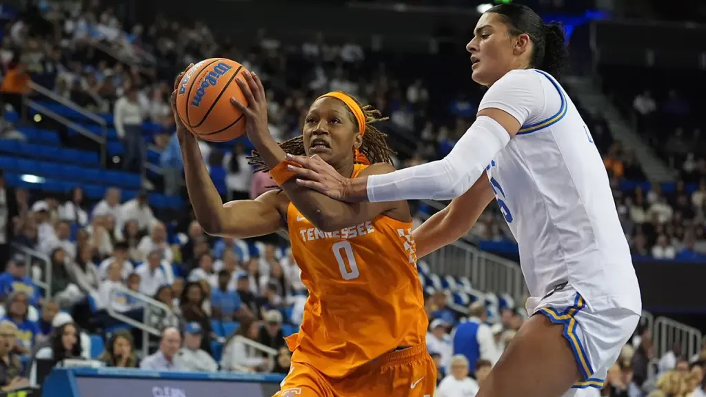 Tennessee's Janiah Barker has an uncomfortable interaction with the UCLA coach after the game.
