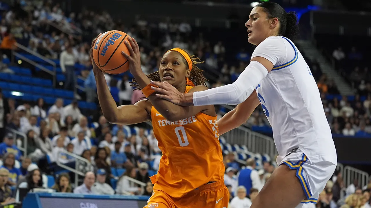 Tennessee's Janiah Barker has an uncomfortable interaction with the UCLA coach after the game.