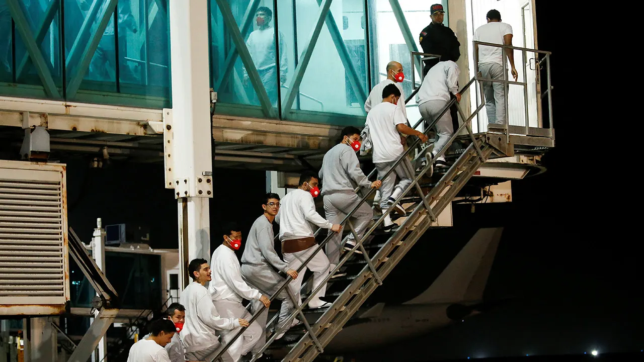 Trump's increase in military action in Venezuela stops deportation flights.