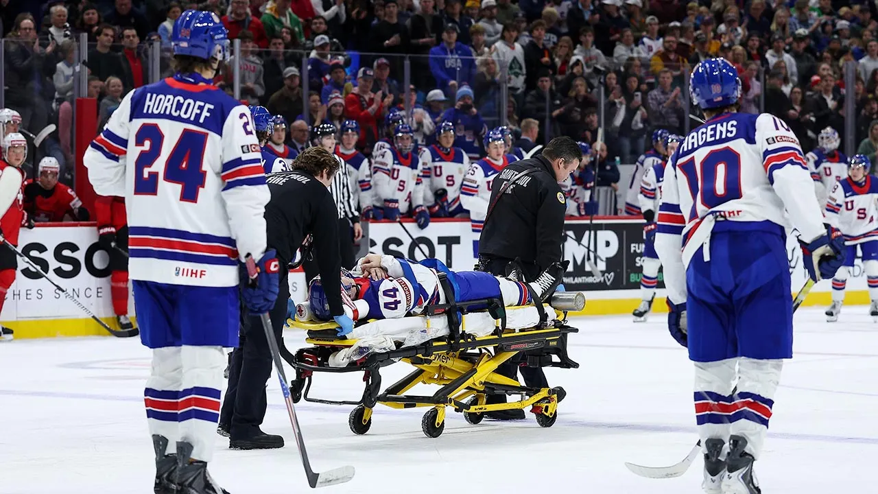 World Juniors: Team USA's Cole Hutson taken off the ice on a stretcher