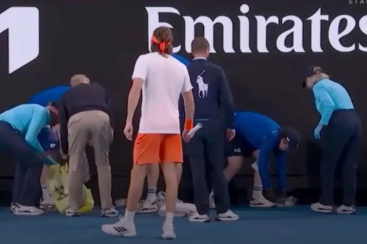 Australian Open match halted after ball girl becomes ill on court during difficult conditions