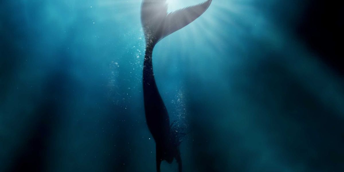 Bare woman attempting to be a mermaid in neighbor's pond lunges at officer who uses taser — with no result, according to police.