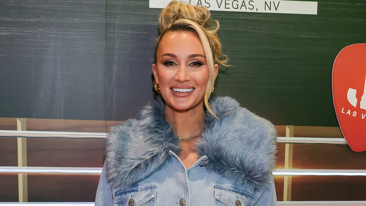 Brittany Aldean shares bikini pictures from their beach vacation as fans admire her style.