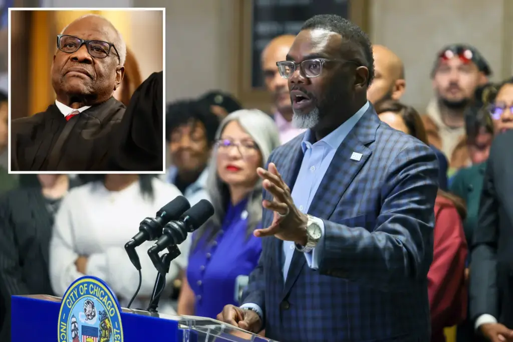 Chicago Mayor Brandon Johnson addresses Clarence Thomas while supporting the city's reparations task force.