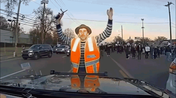 Dashcam footage from a Tennessee trooper reveals a Memphis protester pretending to be injured.