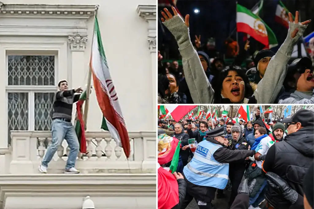 Demonstrator climbs Iranian Embassy in London, removes regime flag, raises pre-revolution emblem