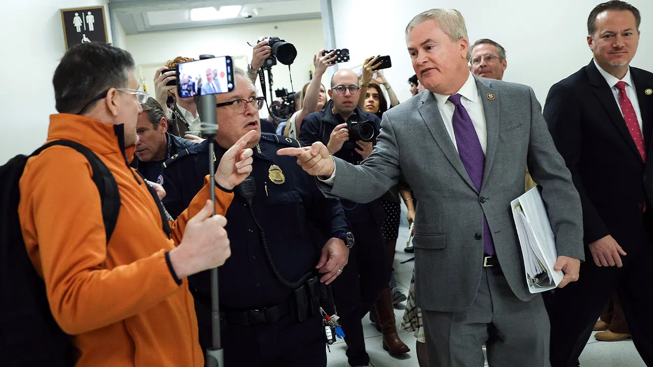 Disruptor interrupts James Comer's briefing after Hillary Clinton misses deposition.