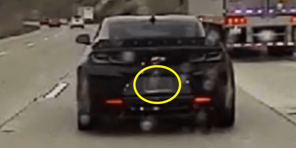 Driver exceeding 100 miles per hour reportedly 'blacks out' and 'turns off' license plate while escaping from police, according to officers.