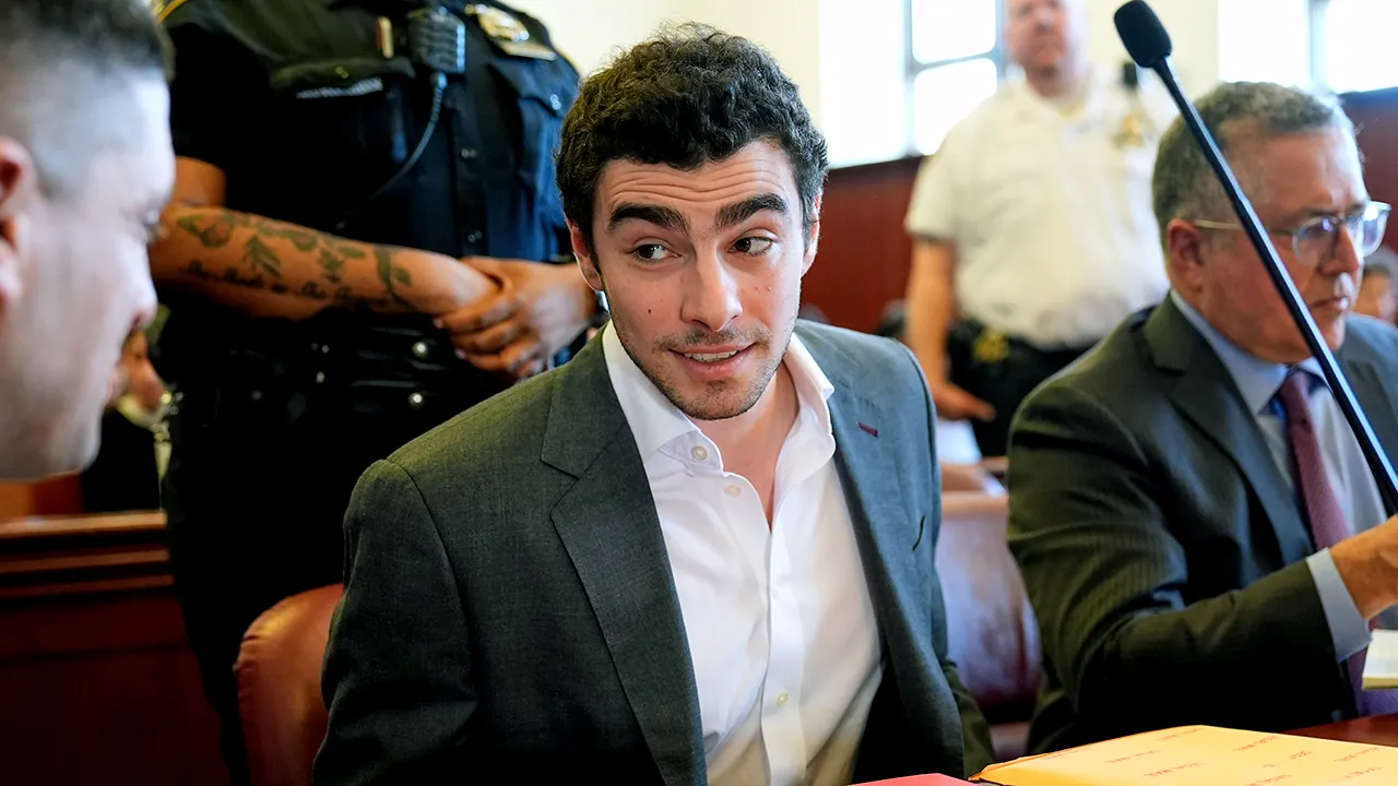 Federal judge calls for a hearing on the confiscation of a backpack.