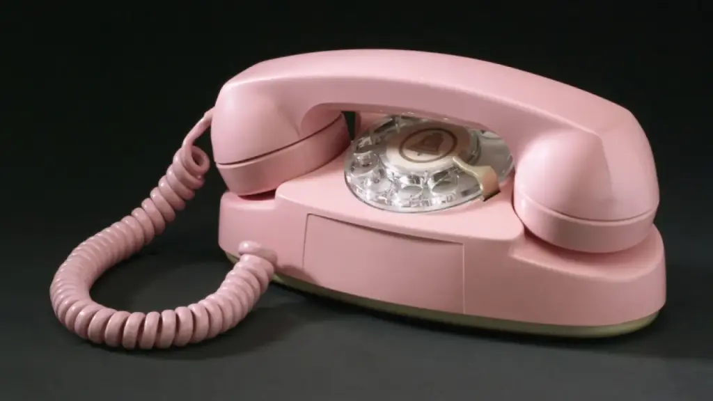 Girl receives a pink landline phone instead of a smartphone for Christmas.