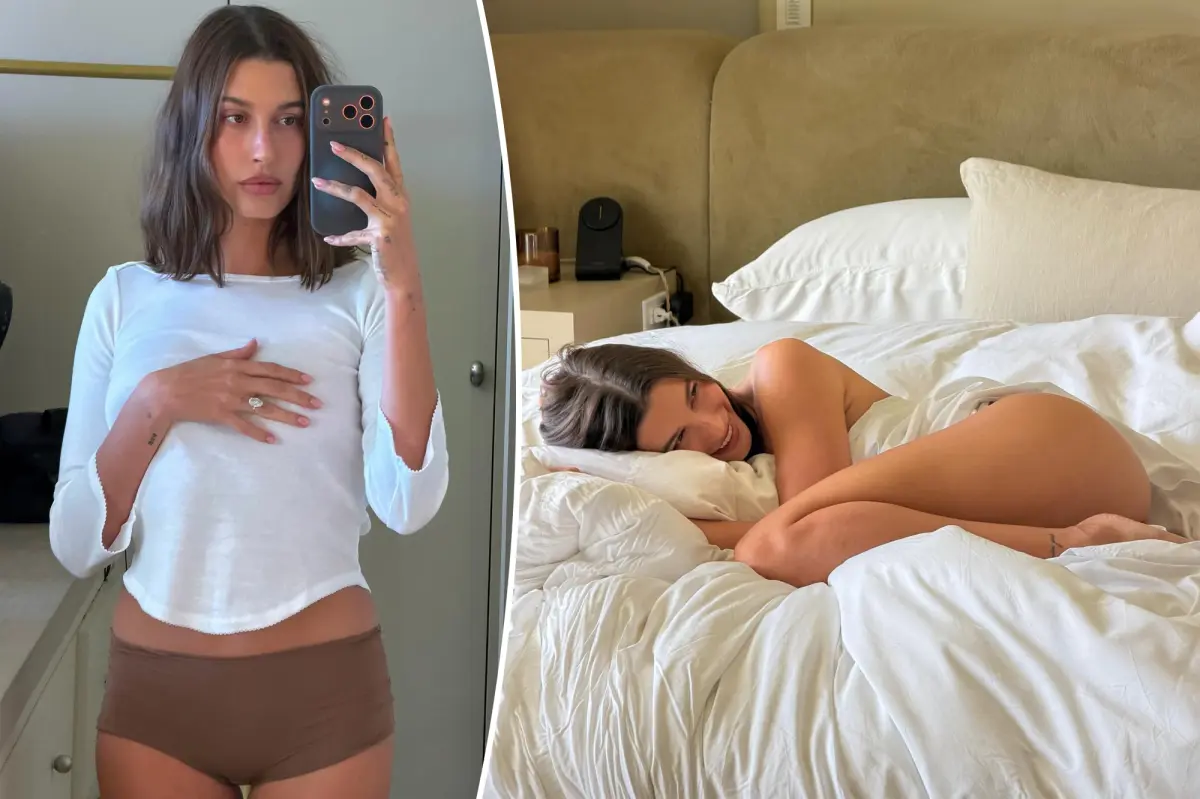Hailey Bieber poses in bed sheets for daring photo shoot
