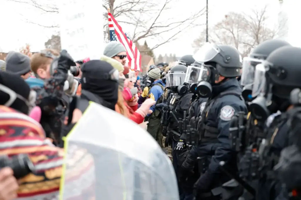 How the rioters in Minneapolis are pressuring Trump to use the Insurrection Act