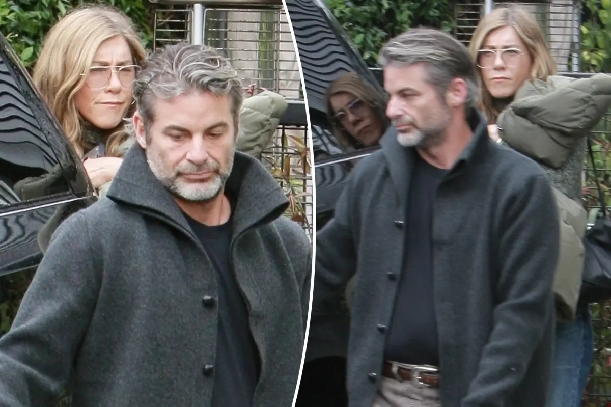Jennifer Aniston attends a book event in support of her boyfriend Jim Curtis.