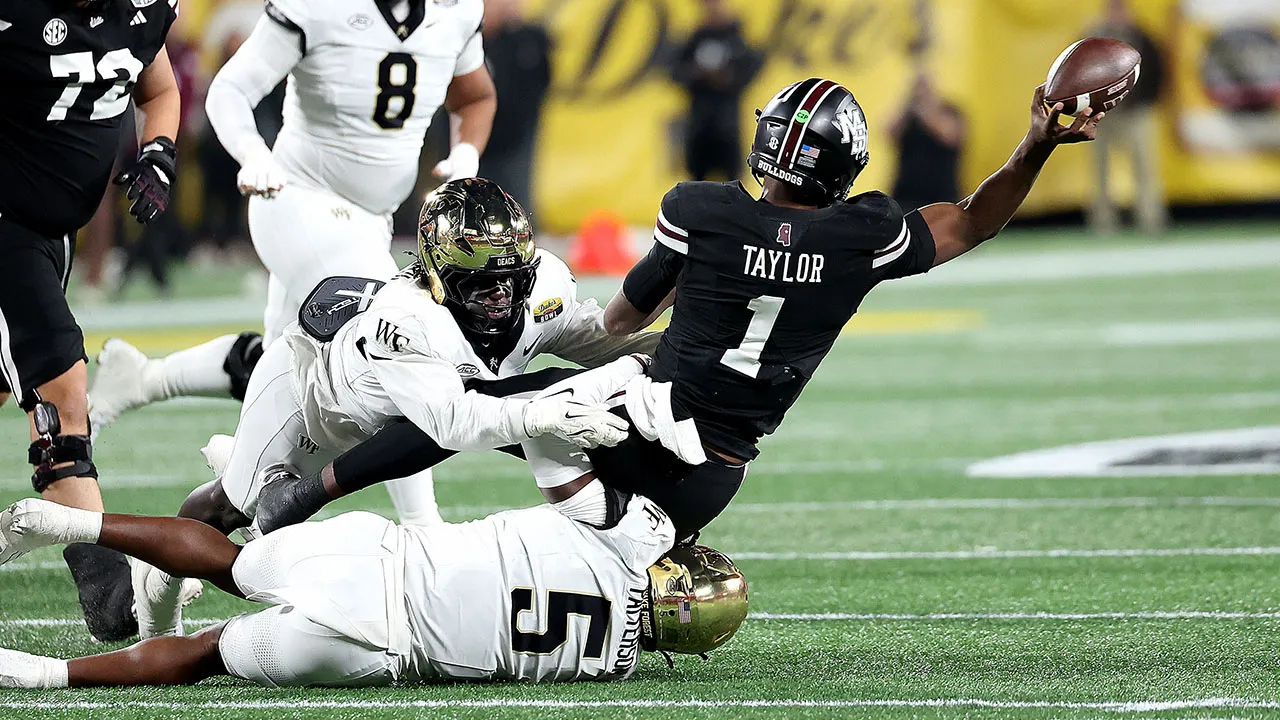 Kamario Taylor seems to escape a serious leg injury during the Duke's Mayo Bowl game.