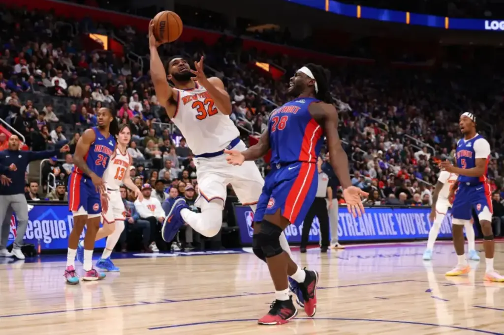 Karl-Anthony Towns attributes his underwhelming performance to adapting to the Knicks' unique system.