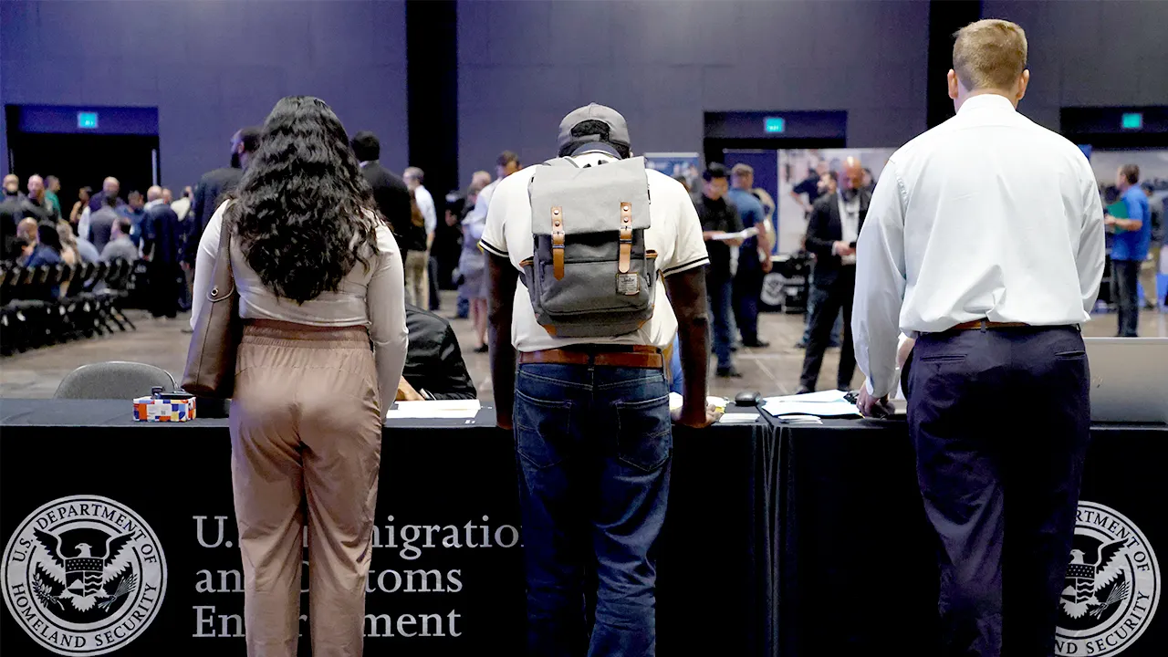 Liberal author criticizes ICE for carelessness in accepting her job application.