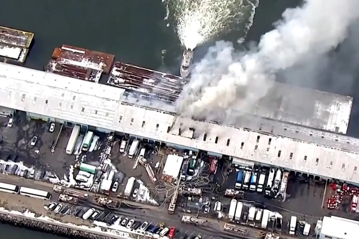 Massive fire engulfs NYC warehouse, causing severe damage and affecting at least 25 businesses.