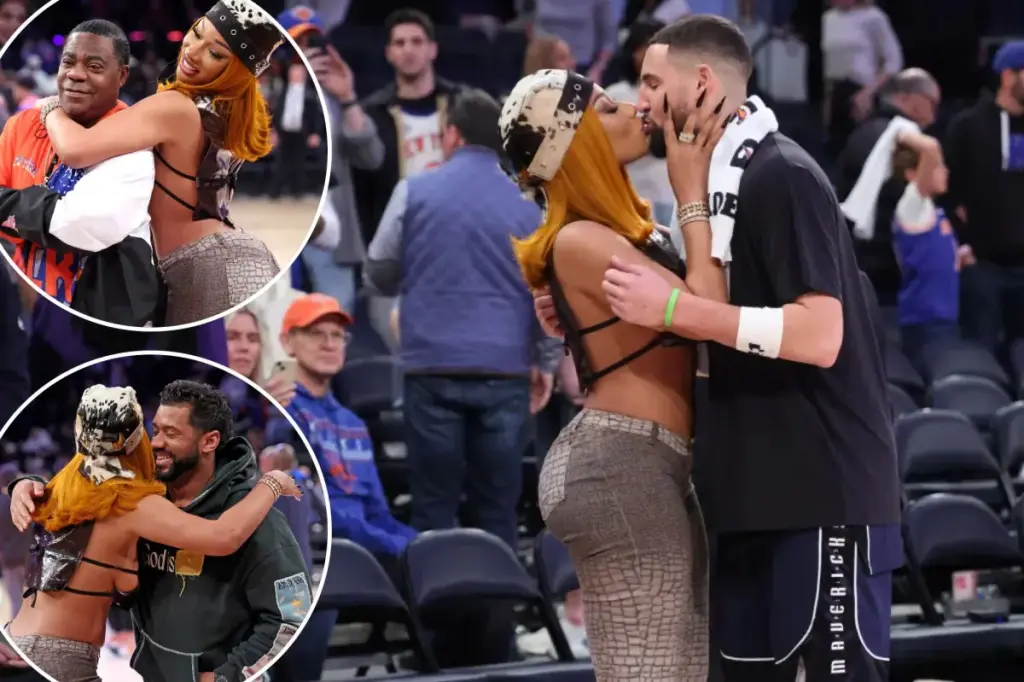 Megan Thee Stallion shares a kiss with Klay Thompson after the Mavericks beat the Knicks.