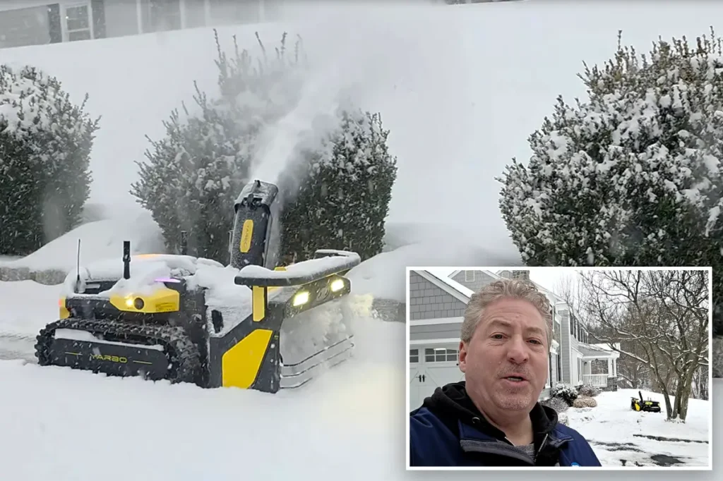 NJ man enjoys coffee while a $5k robot clears his driveway during a huge winter storm.