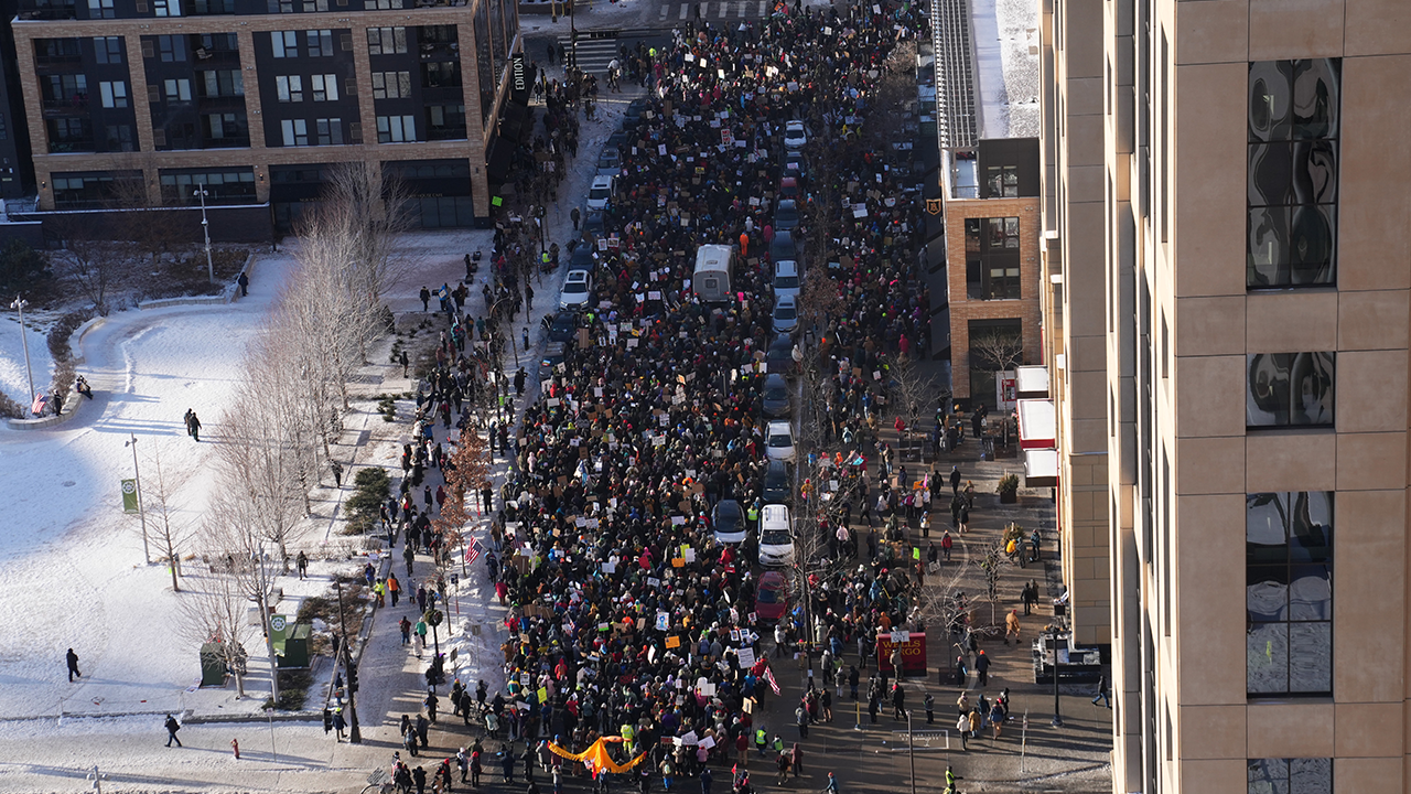 Protesters against ICE gather and demonstrate at Target Center in downtown Minneapolis