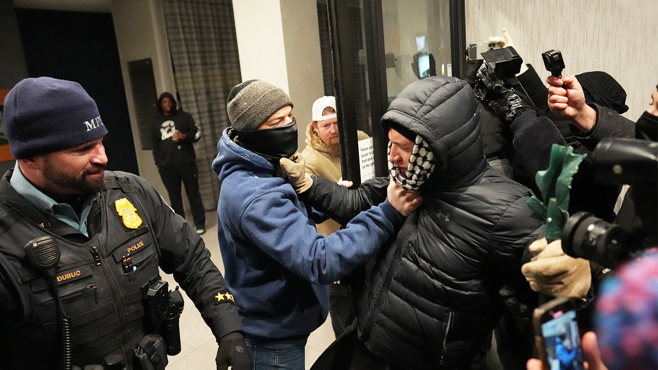 Several individuals were detained after confrontations between protesters and Border Patrol agents at a hotel in Minneapolis.