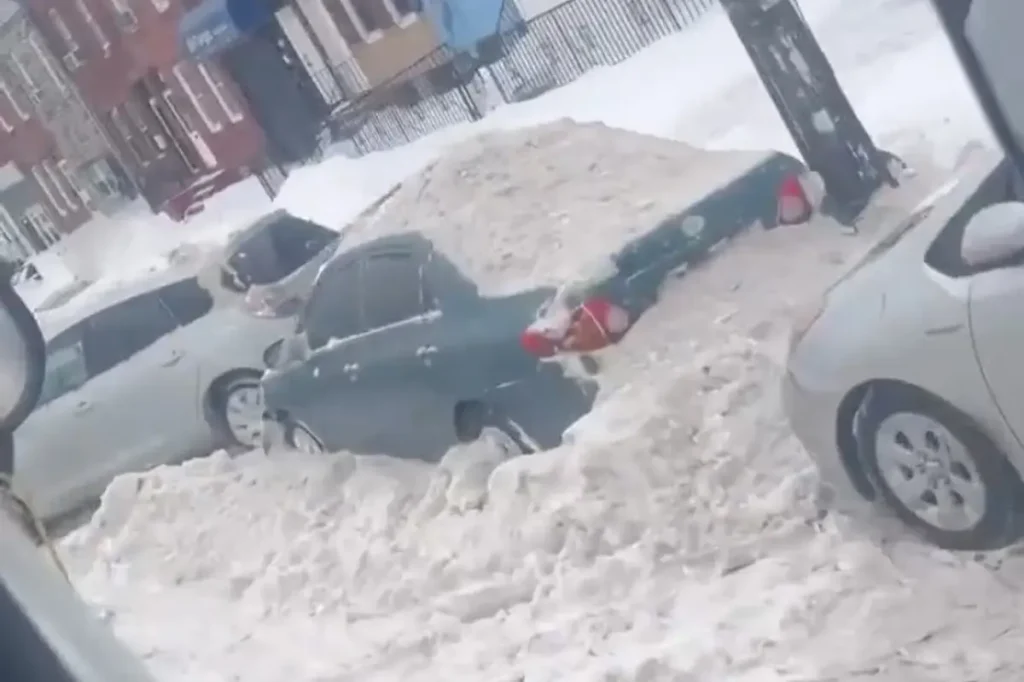 Snowplow driver in Philadelphia films himself deliberately dumping snow on cars