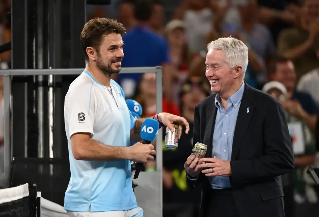 Stan Wawrinka bids farewell to the Australian Open with a toast of beer.