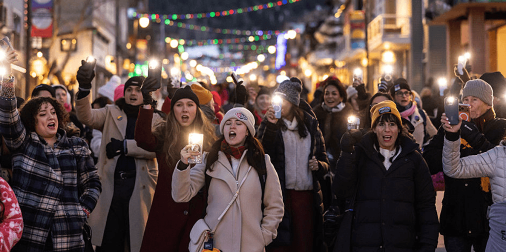 Sundance attendees pause for a 10-minute protest during screenings