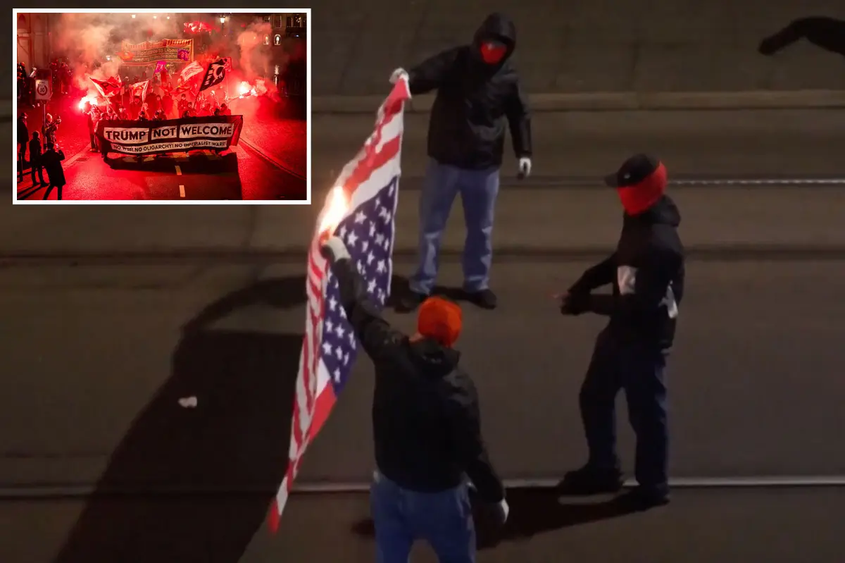 Swiss protesters set fire to US flag before Trump's visit to Davos