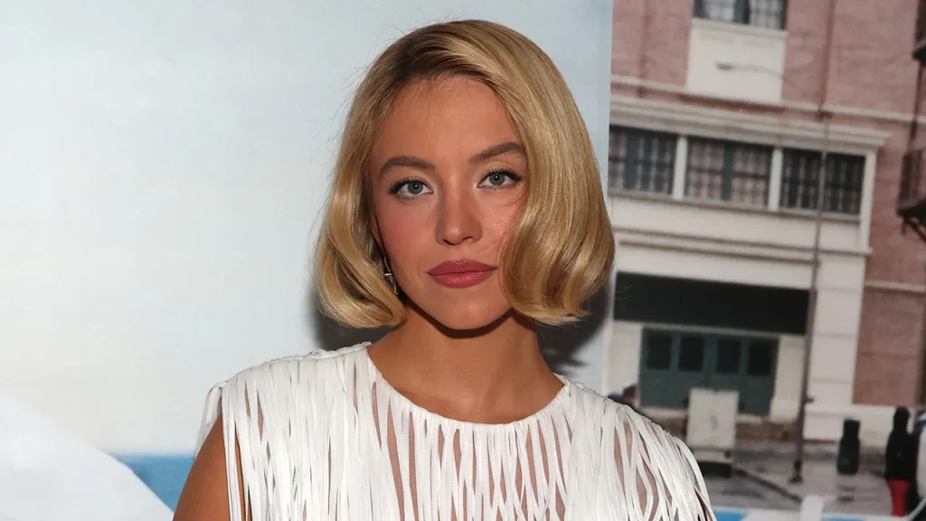 Sydney Sweeney scales Hollywood sign for lingerie brand advertisement