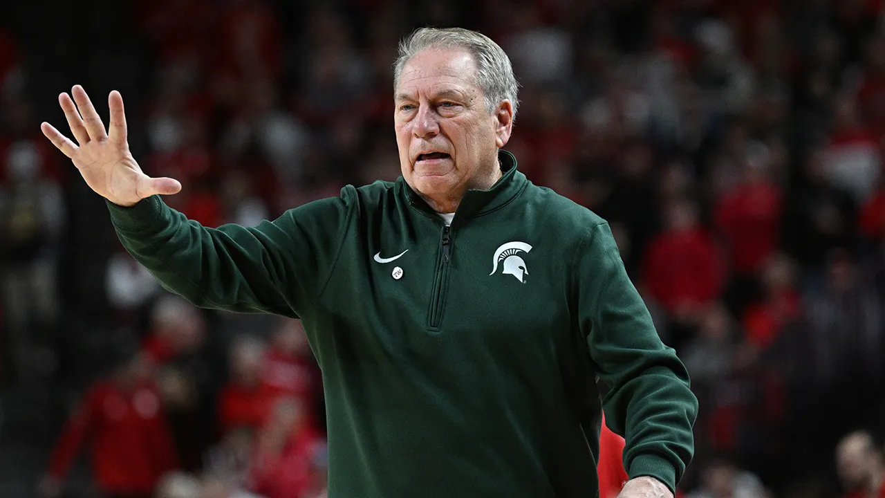 Tom Izzo of the Spartans shouts at a former player, resulting in his ejection from the game