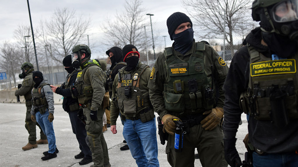 Two individuals taken into custody for supposedly attacking federal officers in Minnesota.