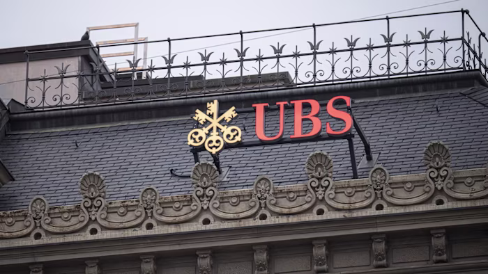 UBS cautions Swiss government to soften bank capital proposals.